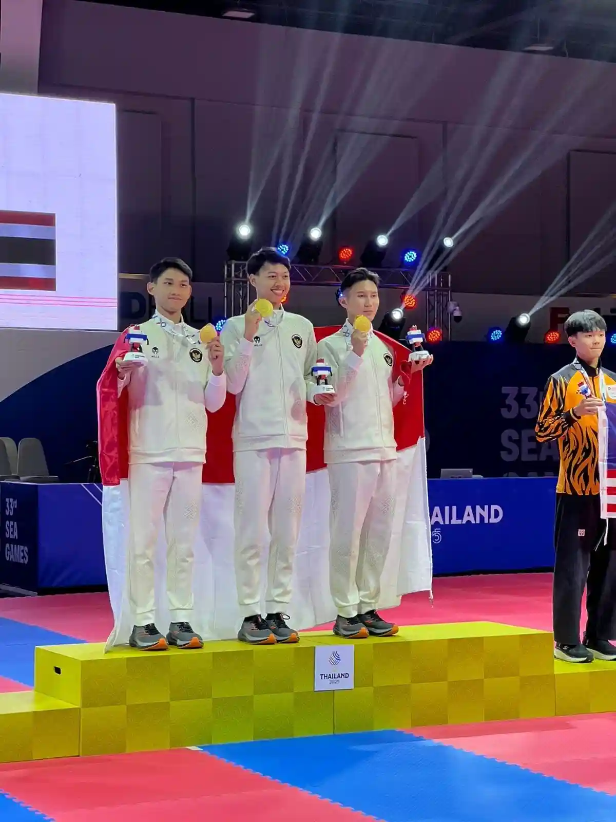 Alfi  Kusuma Anggota TNI Atlet Taekwondo Meraih Medali Emas Sea Games 2025 Thailand