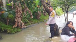 Bhabinkamtibmas Pasir Jaya Lakukan Pemantauan Genangan Air di Kawasan Industri