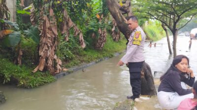 Bhabinkamtibmas Pasir Jaya Lakukan Pemantauan Genangan Air di Kawasan Industri