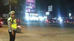 Kanit Lantas Polsek Cikupa Pantau Arus Lalu Lintas di Gerbang dan Pos Terpadu Citra Raya Tangerang