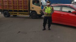 IPTU Rusandi Pimpin PECAK Sore, Urai Kemacetan di Simpang Cikupa Mas