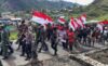 IMG-20260601-WA0075 Peringatan Hari Lahir Pancasila, 800 Warga Puncak Jaya Kirab Bendera 50 Meter