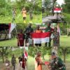 Semangat Kemerdekaan Berkibar di Kampung Sesor, Satgas TMMD Ke-129 Kodim 1807/Sorong Selatan Pasang Bendera Merah Putih