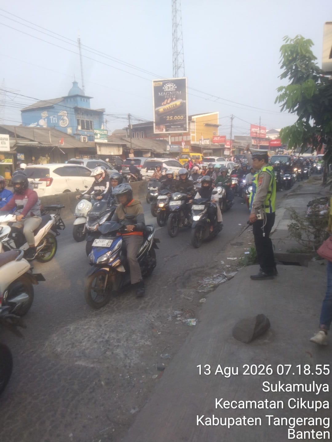 Personel Lantas Polsek Cikupa Laksanakan PECAK, Atur Arus Lalu Lintas Pagi Hari